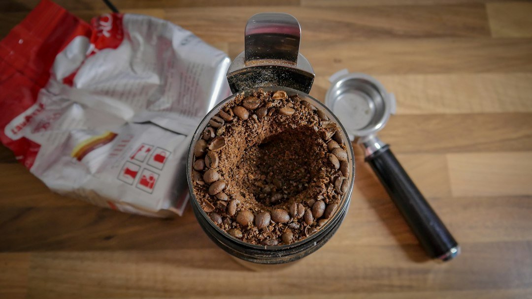 Coffee beans and partially ground coffee.