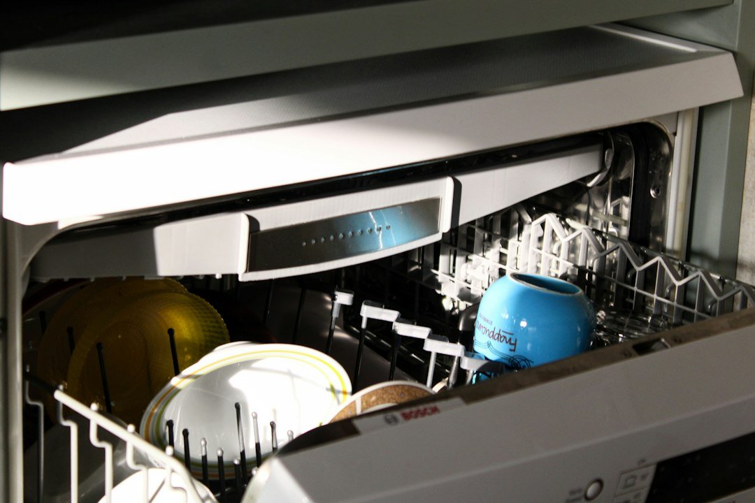 Mug positioned inside a dishwasher rack